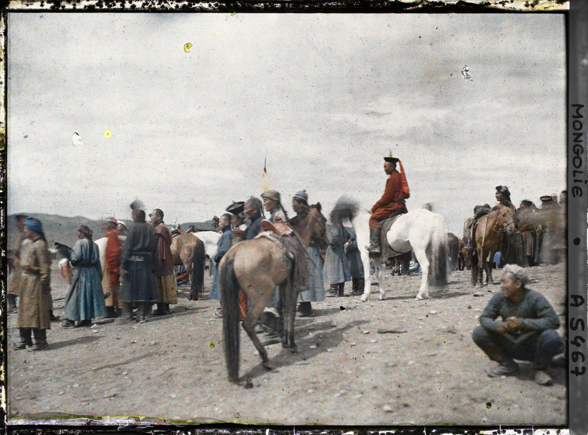 Image représentant Des spectateurs sur la place du marché