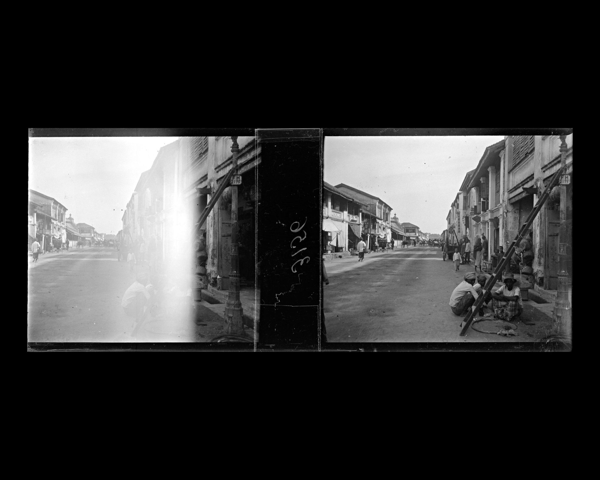 Image représentant Scène de rue dans le quartier commerçant