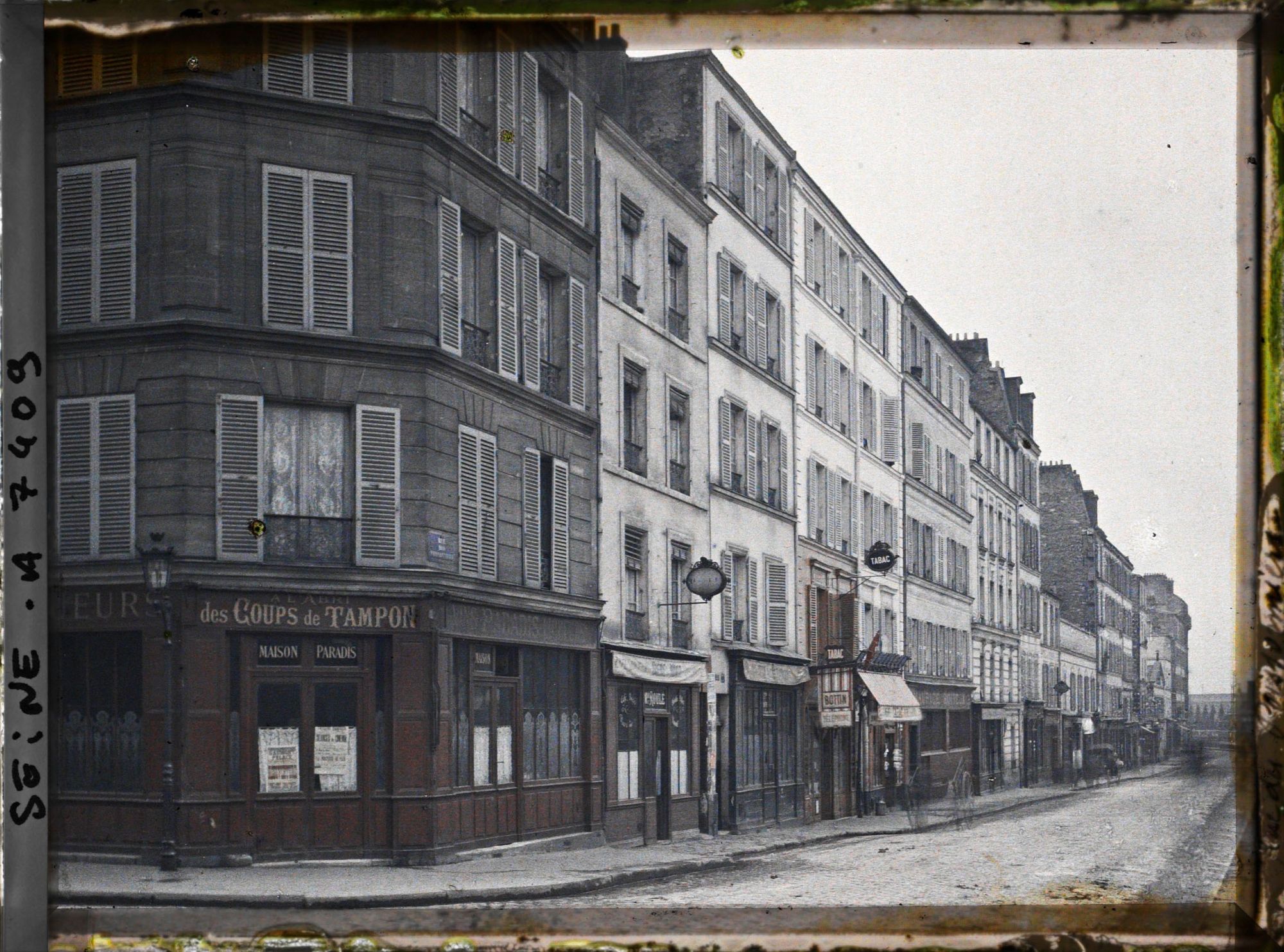 Image représentant La rue des Poissonniers à l'angle de la rue des Portes-Blanches