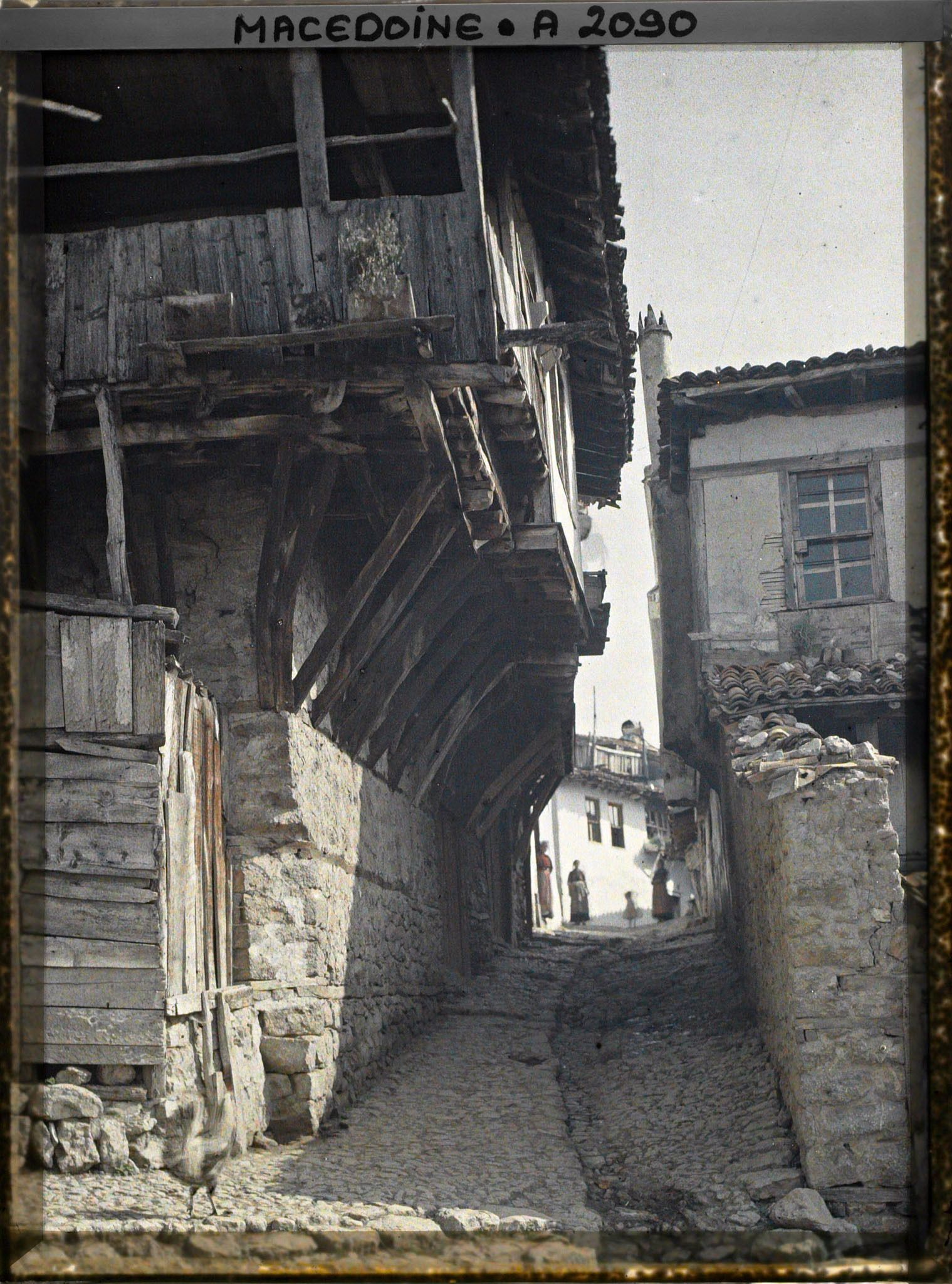 Image représentant Vieille maison de bois et tour de pierre