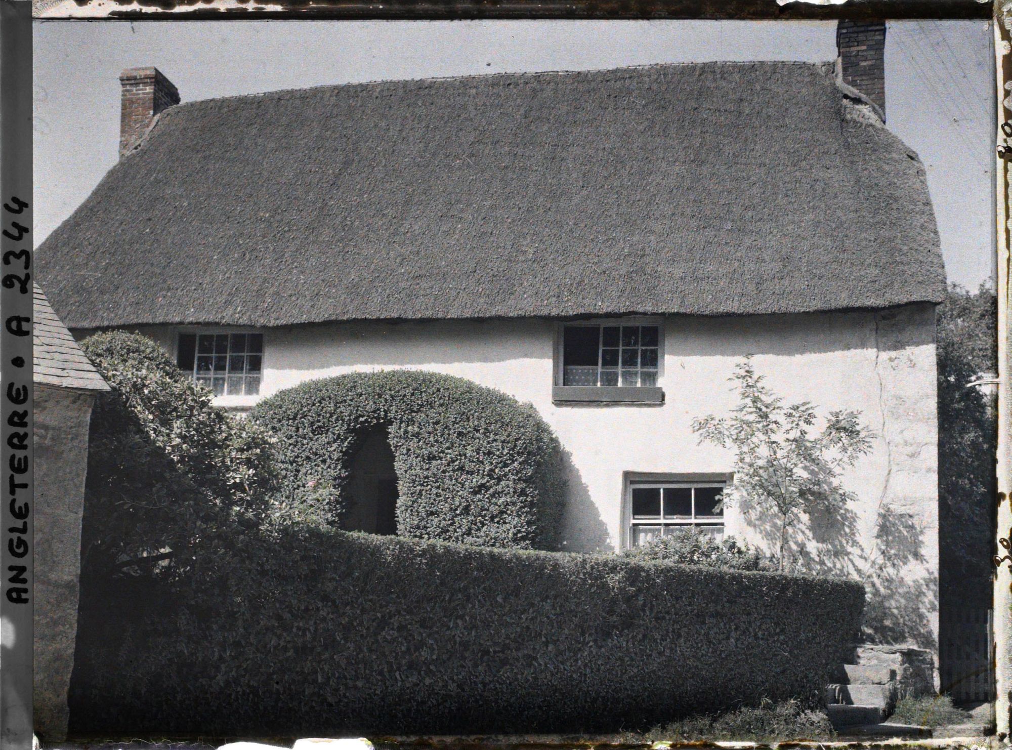 Image représentant Une maison dotée d'un toiture en chaumes