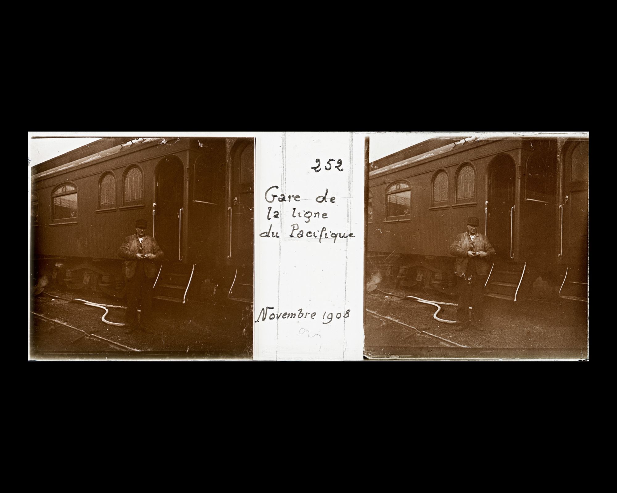 Image représentant Un cheminot près d'un wagon en gare de la ligne du Pacifique