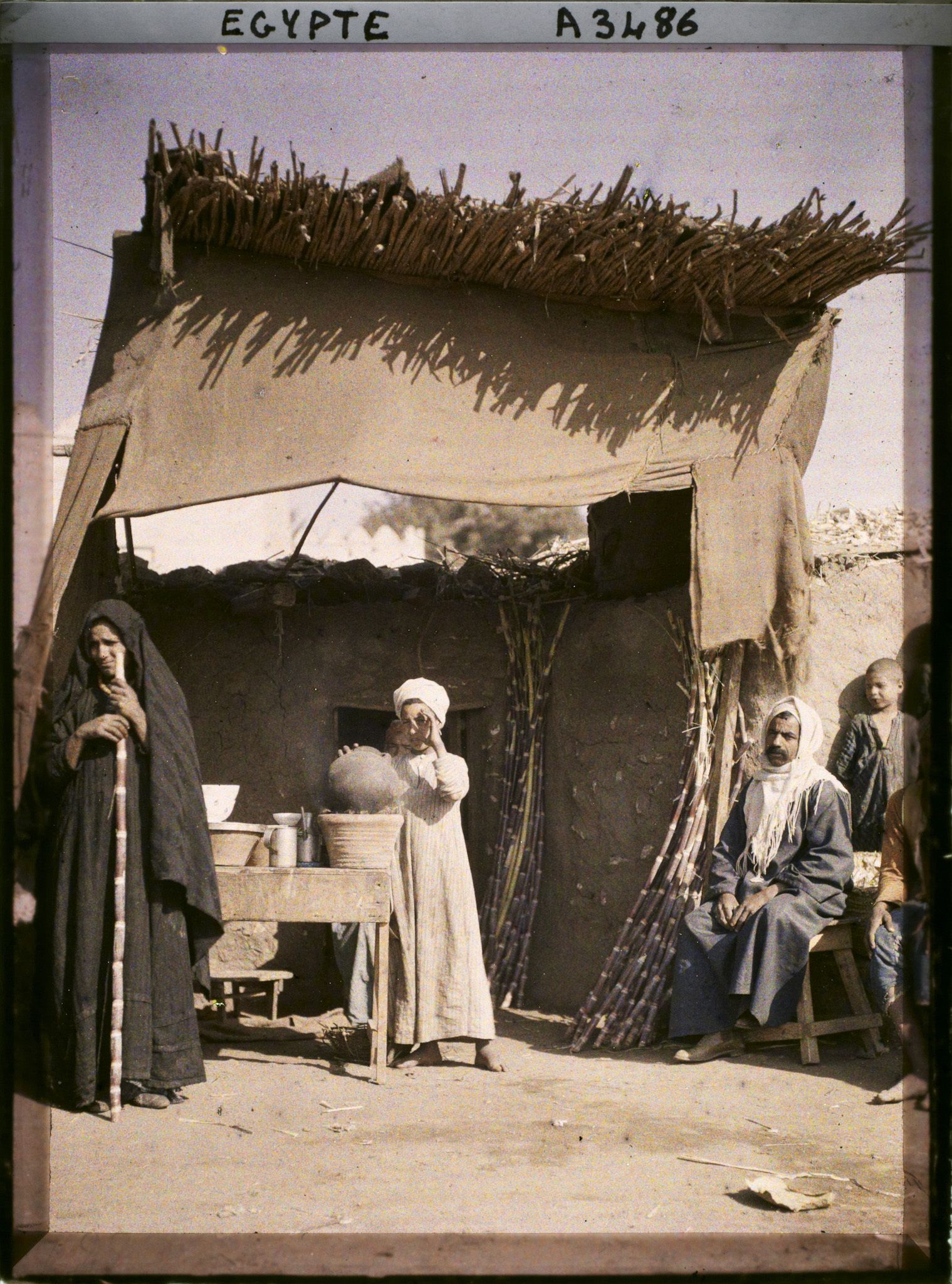 Image représentant Marchand de fèves cuites et de cannes à sucre