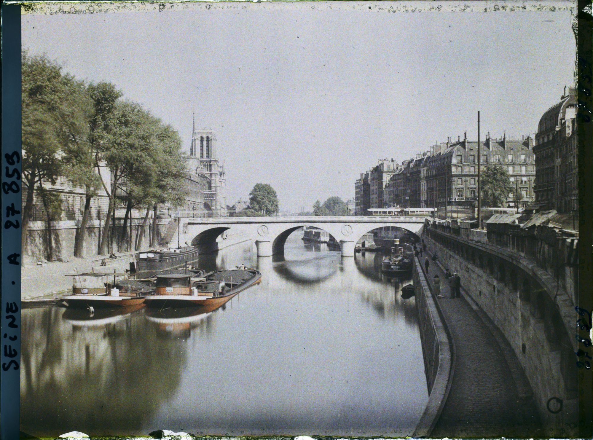 Image représentant Le pont Saint-Michel et Notre-Dame depuis le port des Grands-Augustins