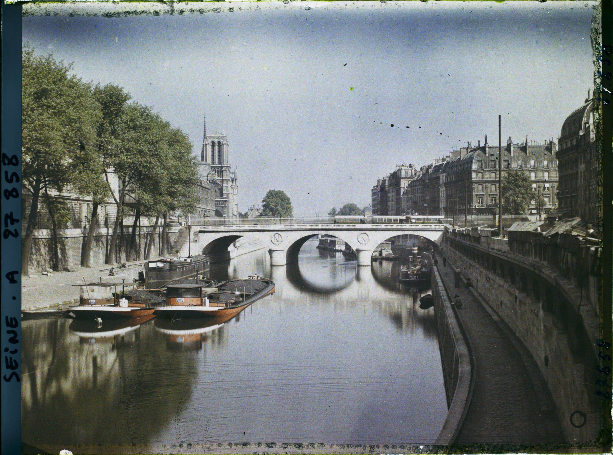 Image représentant Le pont Saint-Michel et Notre-Dame depuis le port des Grands-Augustins