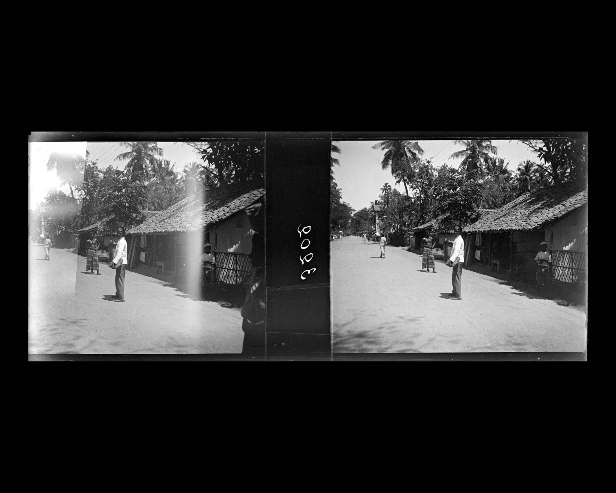 Image représentant Scène de rue, probablement dans le quartier de Colpetty