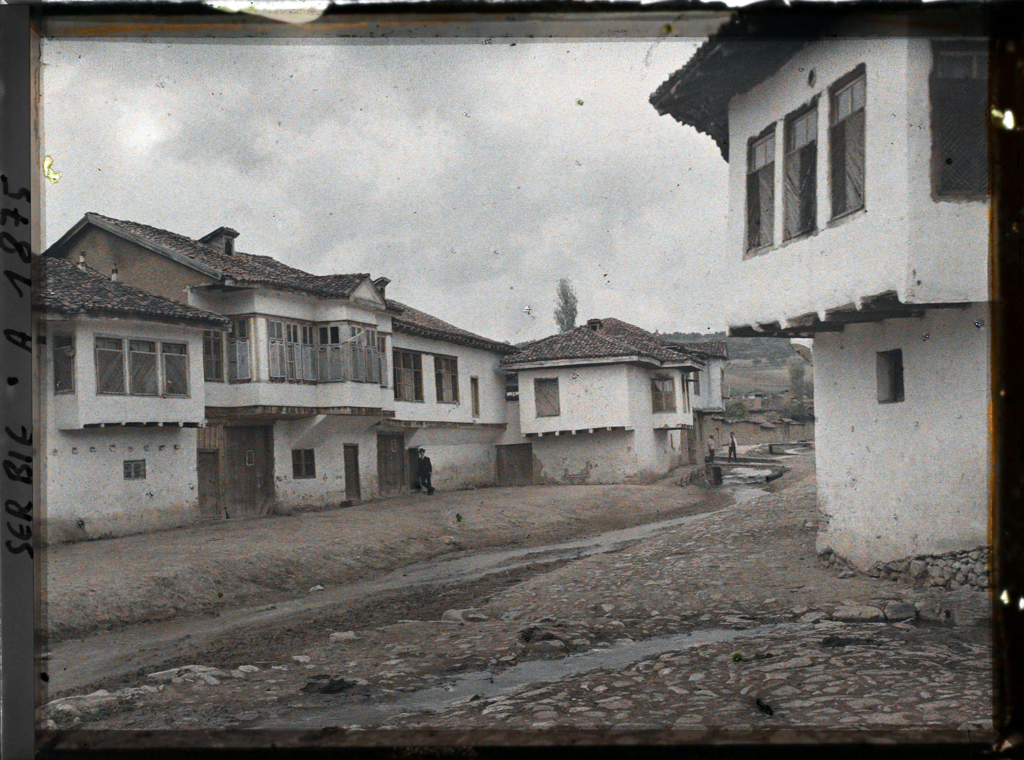 Image représentant Maisons turques de part et d'autre de ruisseau Viljusa