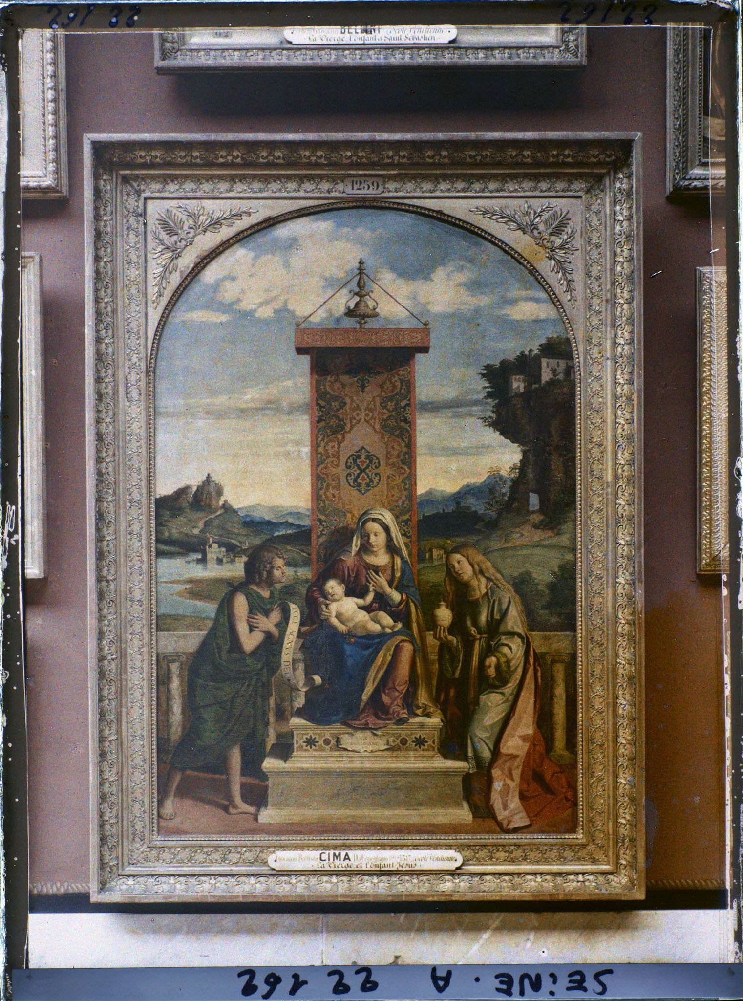 Image représentant La Vierge et l'Enfant entre saint Jean-Baptiste et sainte Marie-Madeleine, Cima da Conegliano, musée du Louvre