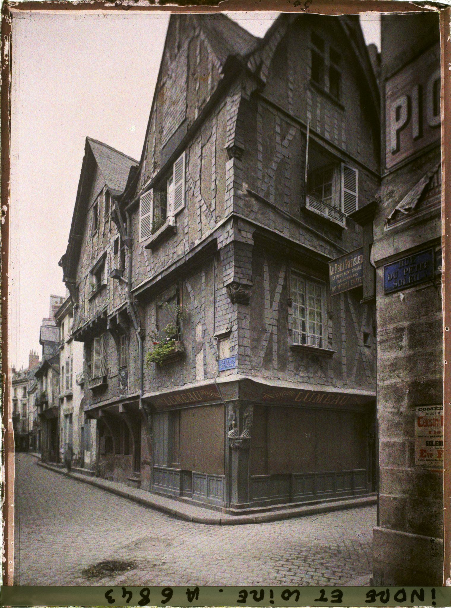 Image représentant Une maison à colombages à l'angle de la rue du change et la rue de la Rôtisserie