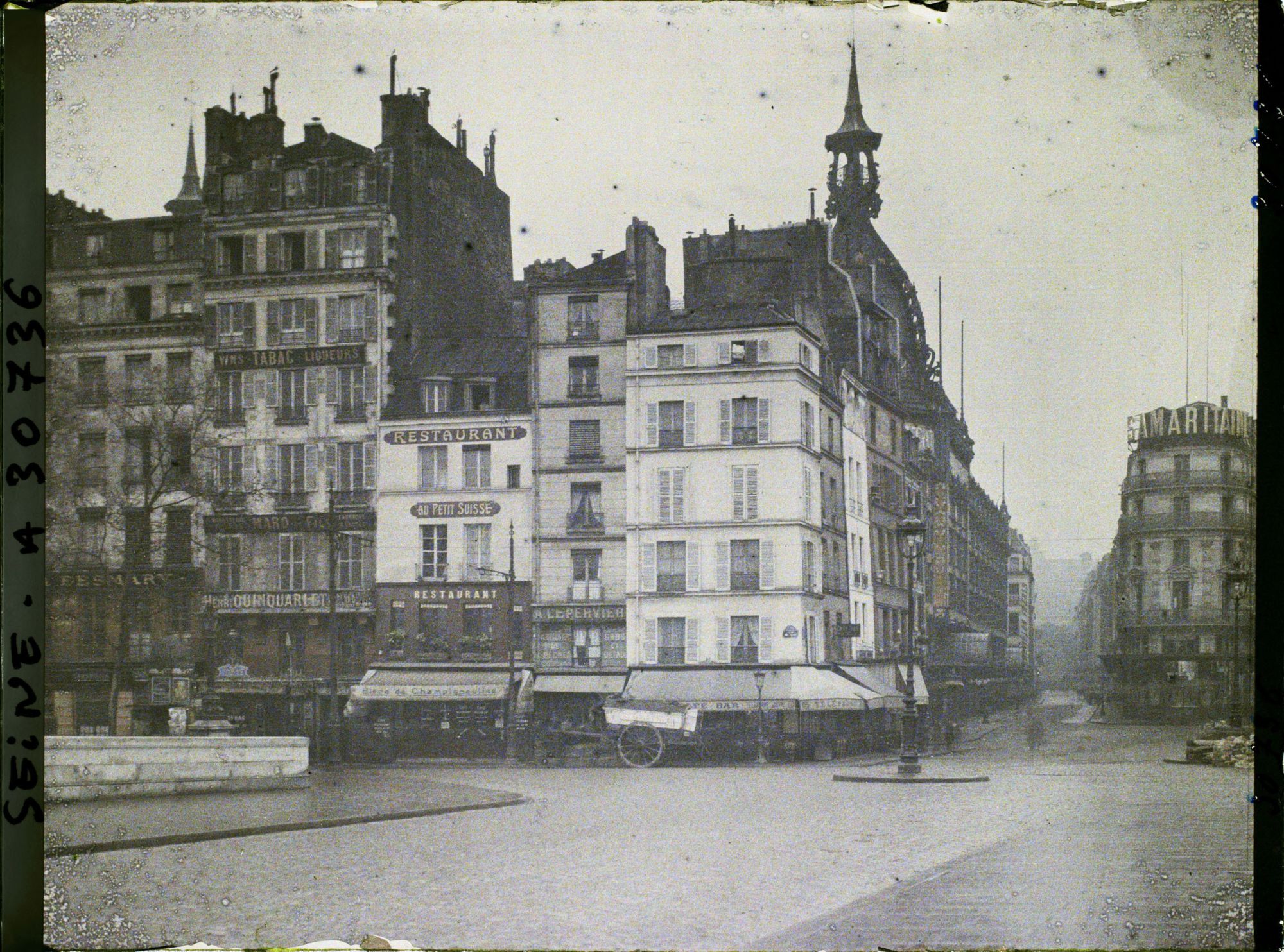 Image représentant L'angle du quai du Louvre et de la rue de la Monnaie et la Samaritaine vus du Pont-Neuf