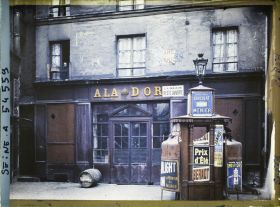 Image représentant Enseigne "A la Grappe d'Or" au n° 37 rue des Lombards