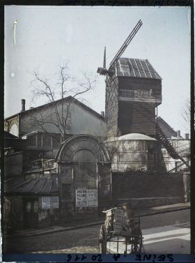 Image représentant Le moulin de la Galette, à l'angle des rues Lepic et Girardon
