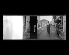 Image représentant Scène de rue dans le quartier commerçant