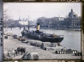 Image représentant Le quai du Louvre (actuel quai François-Mitterand) et l'île de la Cité, en face le quai de Conti et l'Institut de France