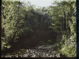 Image représentant L'entrée de la grotte du Tuc d'Audoubert et les Begouën