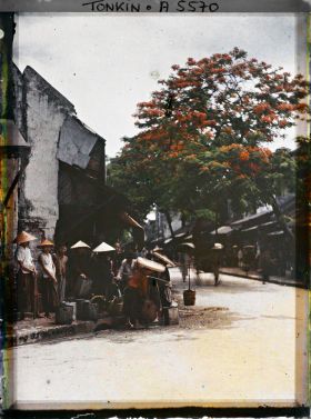 Image représentant Des porteurs d'eau dans la " rue des Ferblantiers "