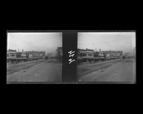 Image représentant Une grande avenue bordée de magasins, probablement Market Street