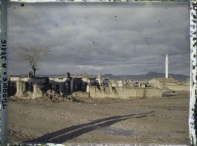 Image représentant Quartier en ruines au soleil couchant