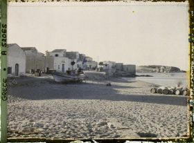 Image représentant Maisons du bord de mer, un bateau sur la plage
