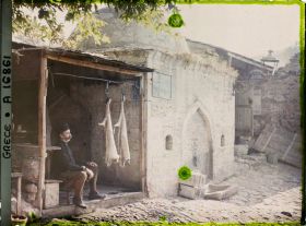 Image représentant Un boucher à son étal