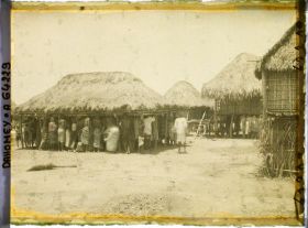 Image représentant Scène de palabre sous une case