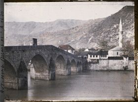 Image représentant Le vieux pont de pierre, les maisons de pierre