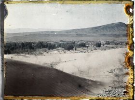 Image représentant Vue de la ville d'Aïn-Sefra avec à l'arrière-plan, le Djebel Aïssa