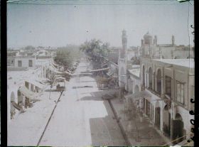 Image représentant Panorama sur une rue du bazar (L'estée ?), et les toits de la ville