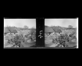 Image représentant Au pied de l'enceinte de la ville, un marché aux fagots rapportés de la montagne, vue depuis le train