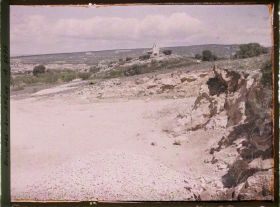 Image représentant Vue panoramique de la ville, avec un moulin