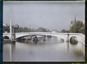 Image représentant Le pont de la Tournelle reconstruit, vue prise depuis le pont Sully