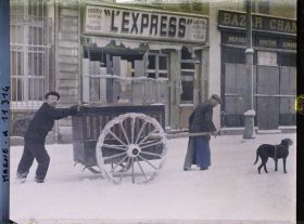 Image représentant Boulanger poussant leur charrette dans la neige