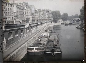 Image représentant Le quai des Grands-Augustins et le Pont-Neuf vus du pont Saint-Michel