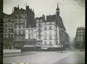 Image représentant L'angle du quai du Louvre et de la rue de la Monnaie et la Samaritaine vus du Pont-Neuf