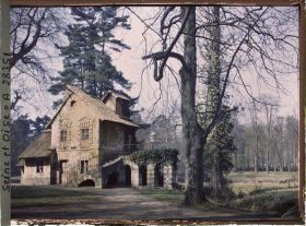 Image représentant Le moulin du Hameau de la Reine dans le Jardin du Petit Trianon