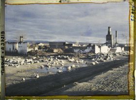 Image représentant Ruines d'un quartier (de la gare) au soleil couchant