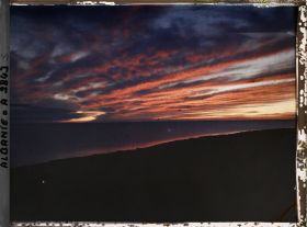 Image représentant Coucher de soleil sur le golfe de Durazzo: plus de coloration de l'eau
