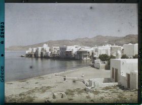 Image représentant Les maisons au bord de la mer; vue prise des moulins