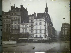 Image représentant L'angle du quai du Louvre et de la rue de la Monnaie et la Samaritaine vus du Pont-Neuf