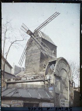 Image représentant Le moulin de la Galette, à l'angle des rues Lepic et Girardon